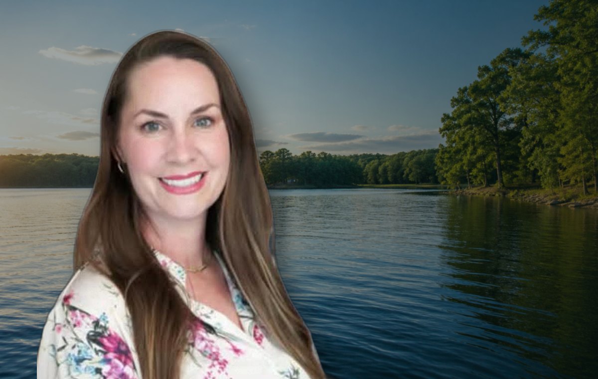 Karen Robinson with Hyco Lake shoreline in the background